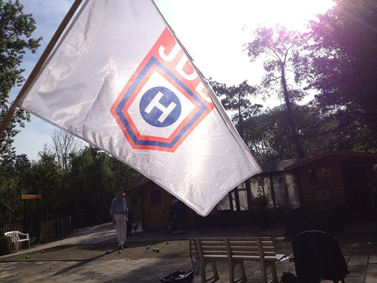 A flag designed for the club's identity. located at the childrens farm at Heijplaat village. photo by: own archive